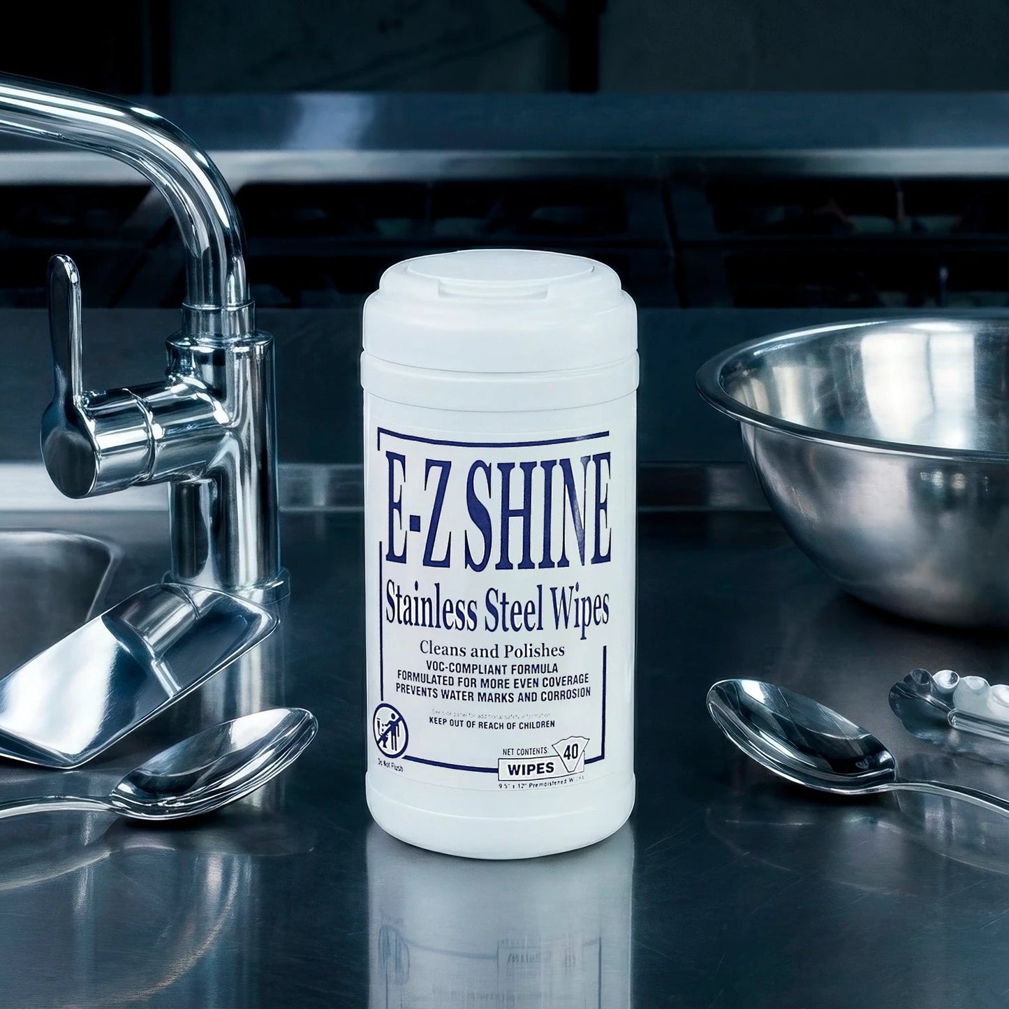 F-L-Shine stainless steel wipes on a kitchen counter with utensils and a sink.